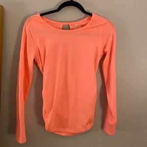 Pink open back workout top